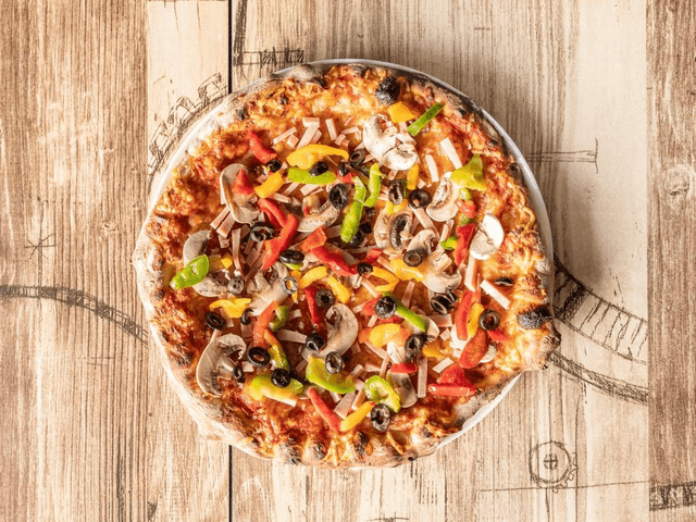 14.4 Saisons : Base tomate, mozzarella, emmental français, jambon de dinde, poivrons, champignons de Paris frais et olives noires.🍗🫑🍄🫒